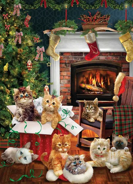 Festive kittens by fireplace