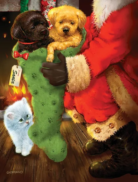 Santa holds adorable puppies