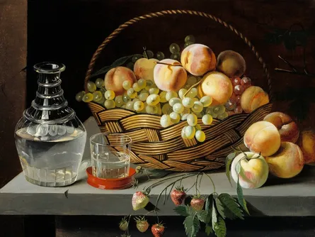 A fruit basket with peaches and grapes