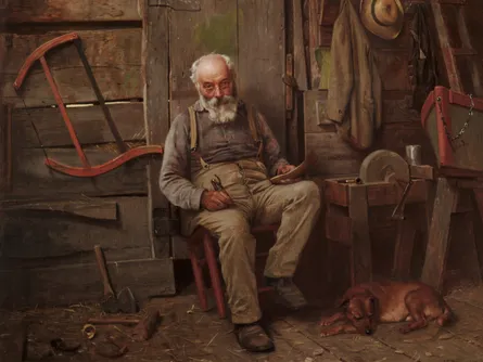 Old man sitting in workshop