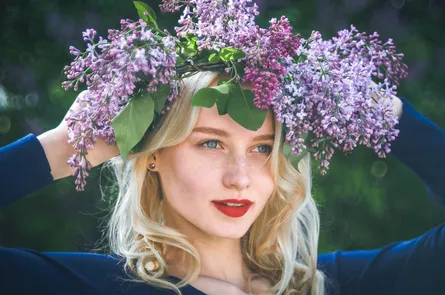 Purple flowers on head