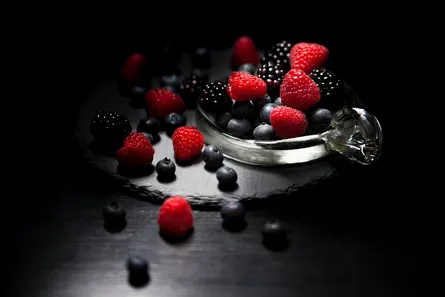 Fresh berries in glass bowl