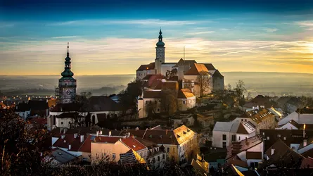 Small town in mountains at sunset