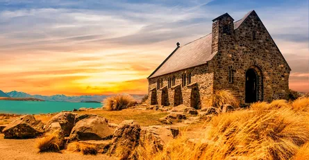 Church in field with sunset