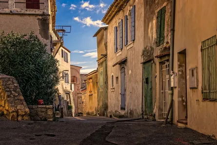 Stone houses line narrow street