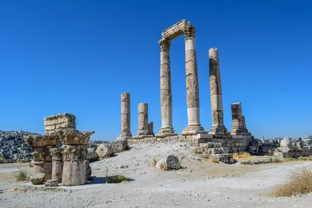 Ancient ruins in background