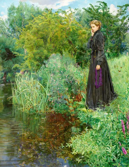 Woman standing in pond