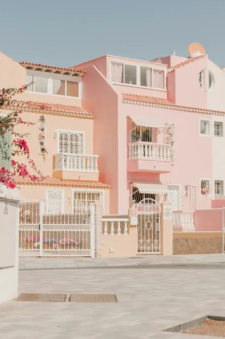 Pink villa with palm trees