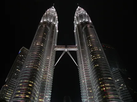 Nighttime view of two tall buildings