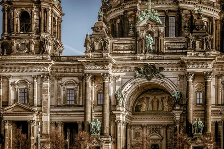 Large, old, ornate building with domes