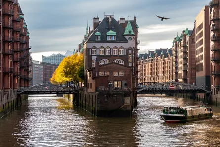 Buildings with clocktowers on river